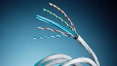 Close-up of a stripped network cable, showing four twisted pairs of colored wires fanned out against a blue background.